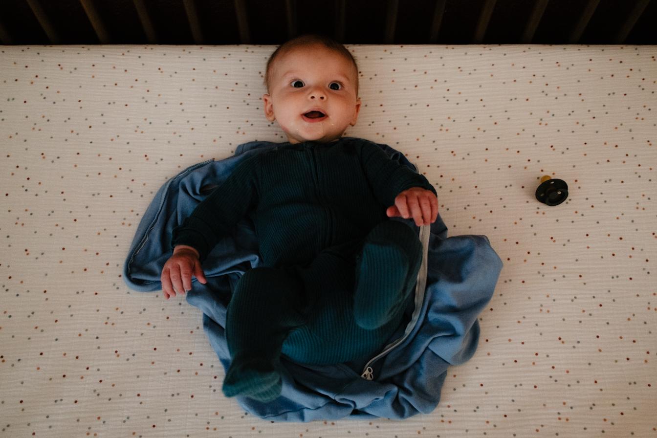 Sawyer playing in bed #1
