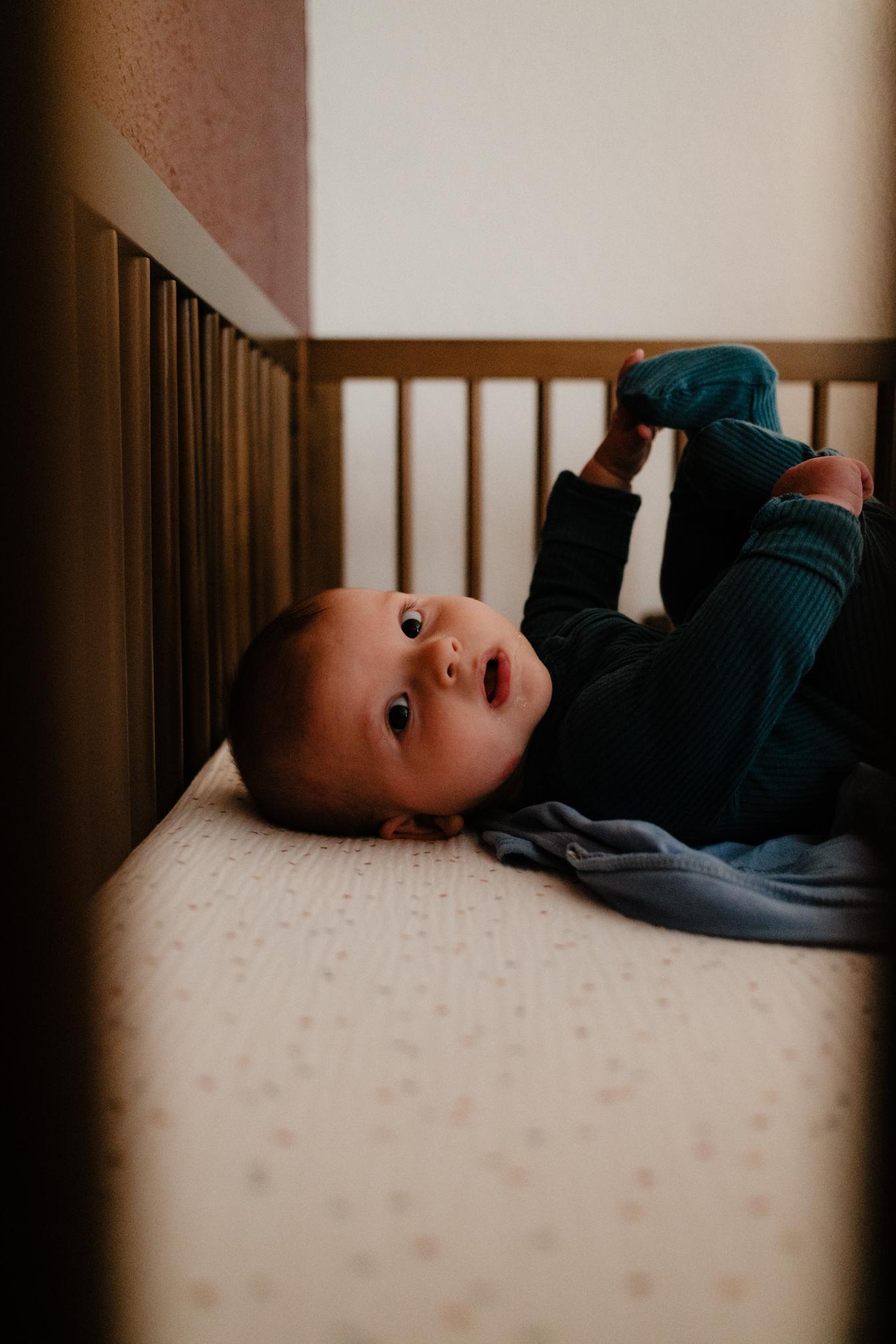 Sawyer playing in bed #2