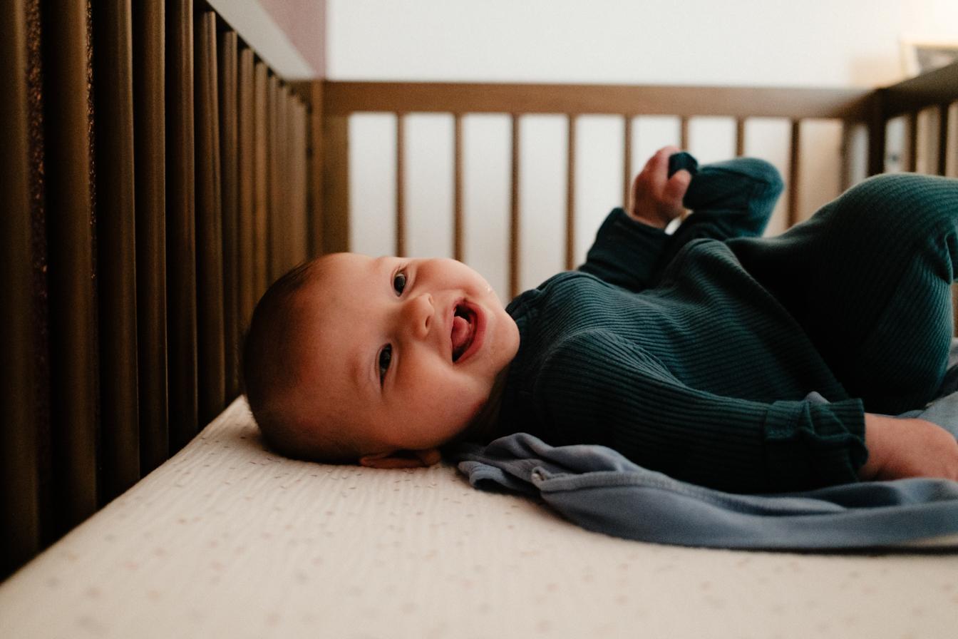 Sawyer playing in bed #3