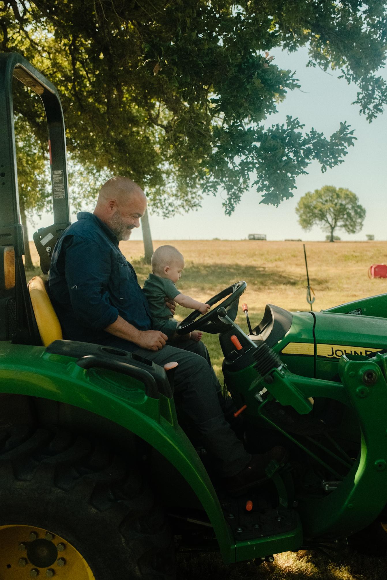 Sawyer steering the tractor #2