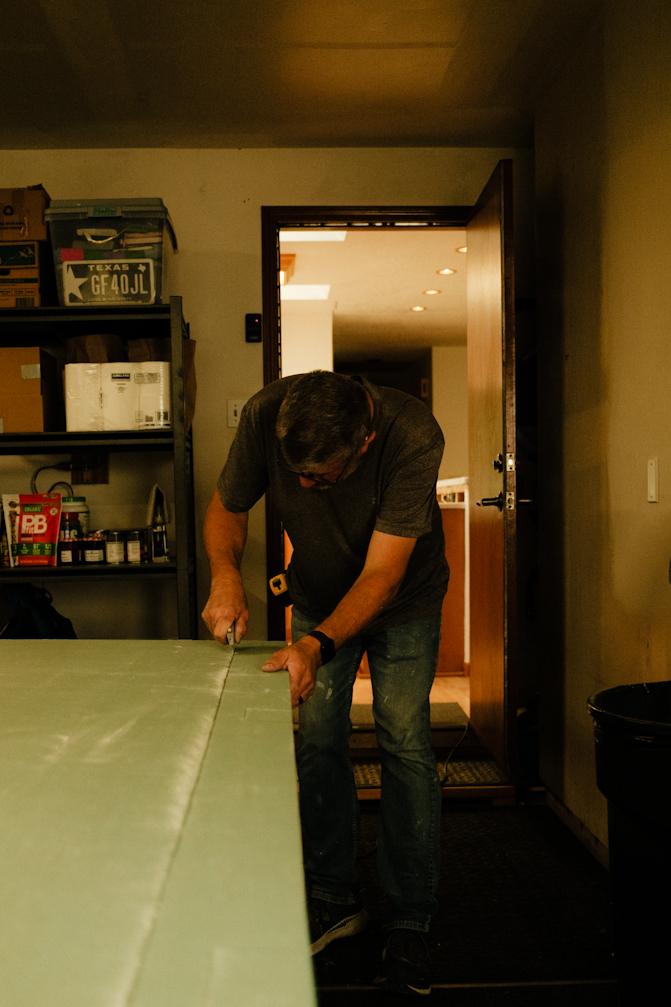 My dad and I working on drywall for our kitchen.