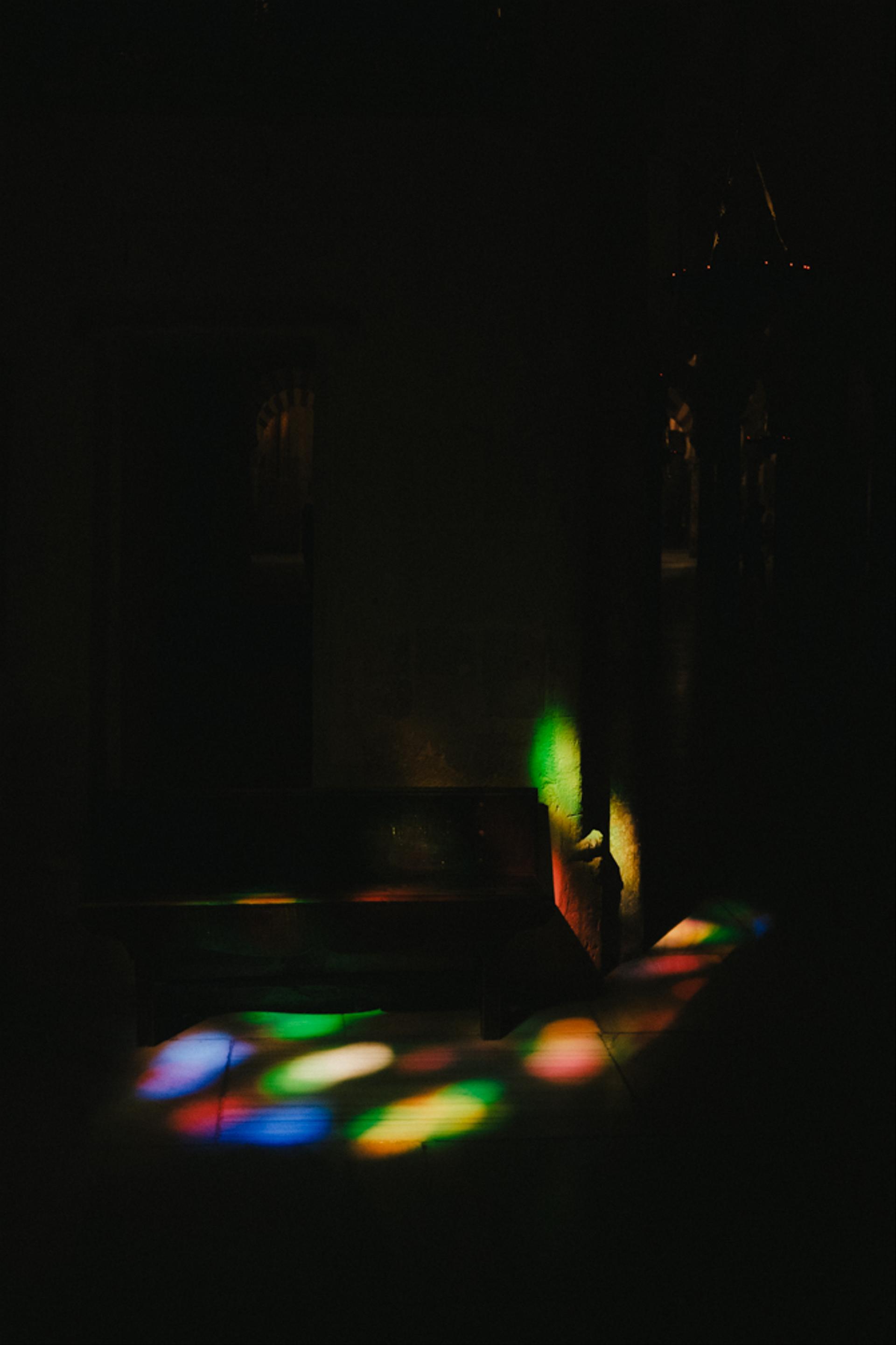 Light hitting a bench in the cathedral.