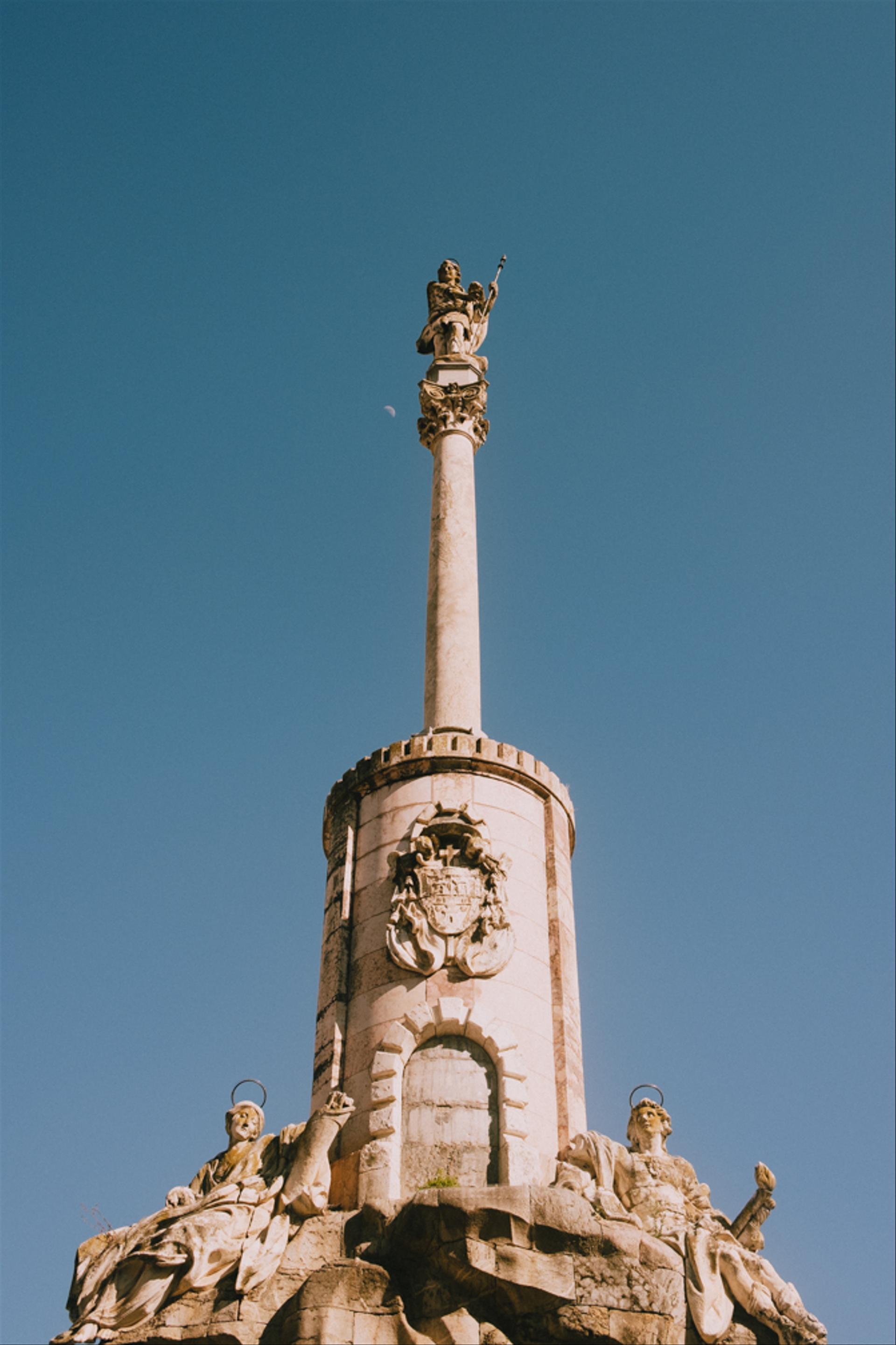 Tower in Cordoba with the moon.